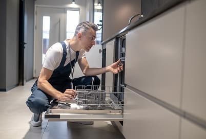 Dishwasher water line being connected