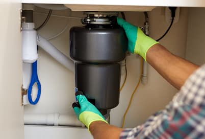 Garbage disposal installed under a sink