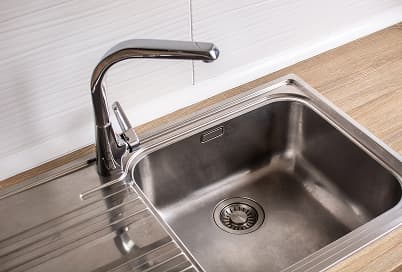New bathroom sink and vanity installed