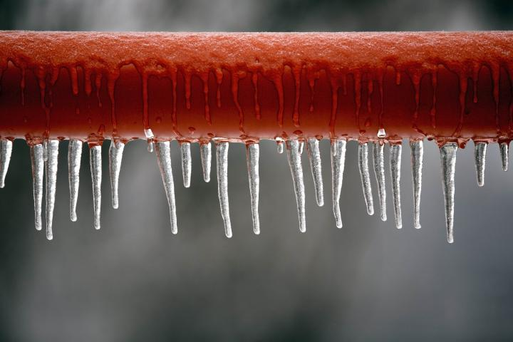 Closeup of frozen pipes