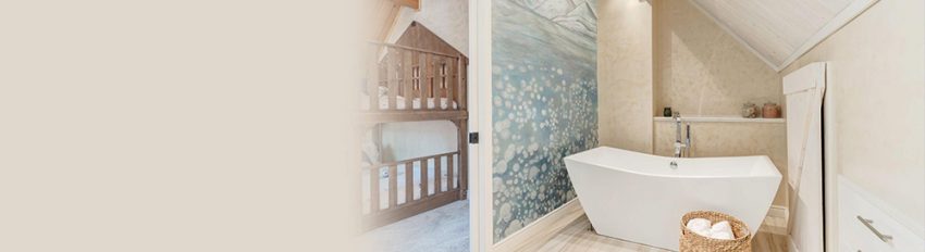 A bathroom with a mural and wood-like tiles, two bathroom tile trends for 2022