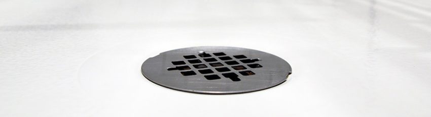 A clogged shower drain
