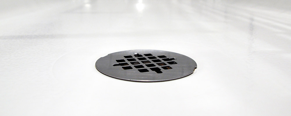 A clogged shower drain
