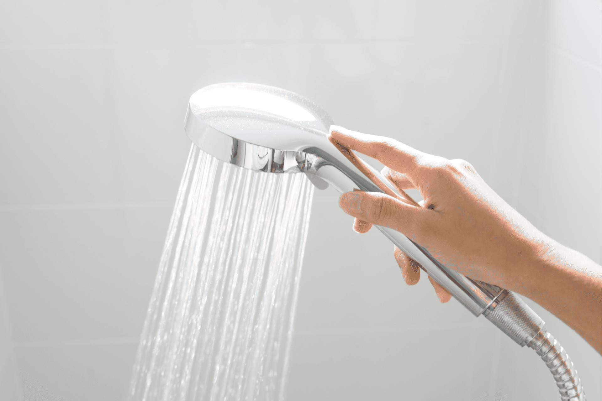 Water flowing from a showerhead 